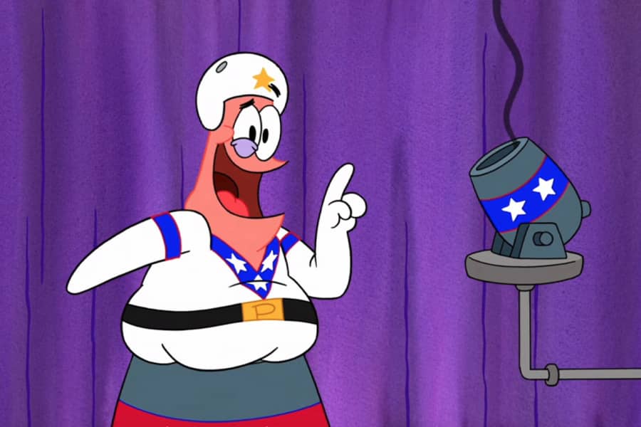 Patrick stuck in a cannon next to a smaller cannon