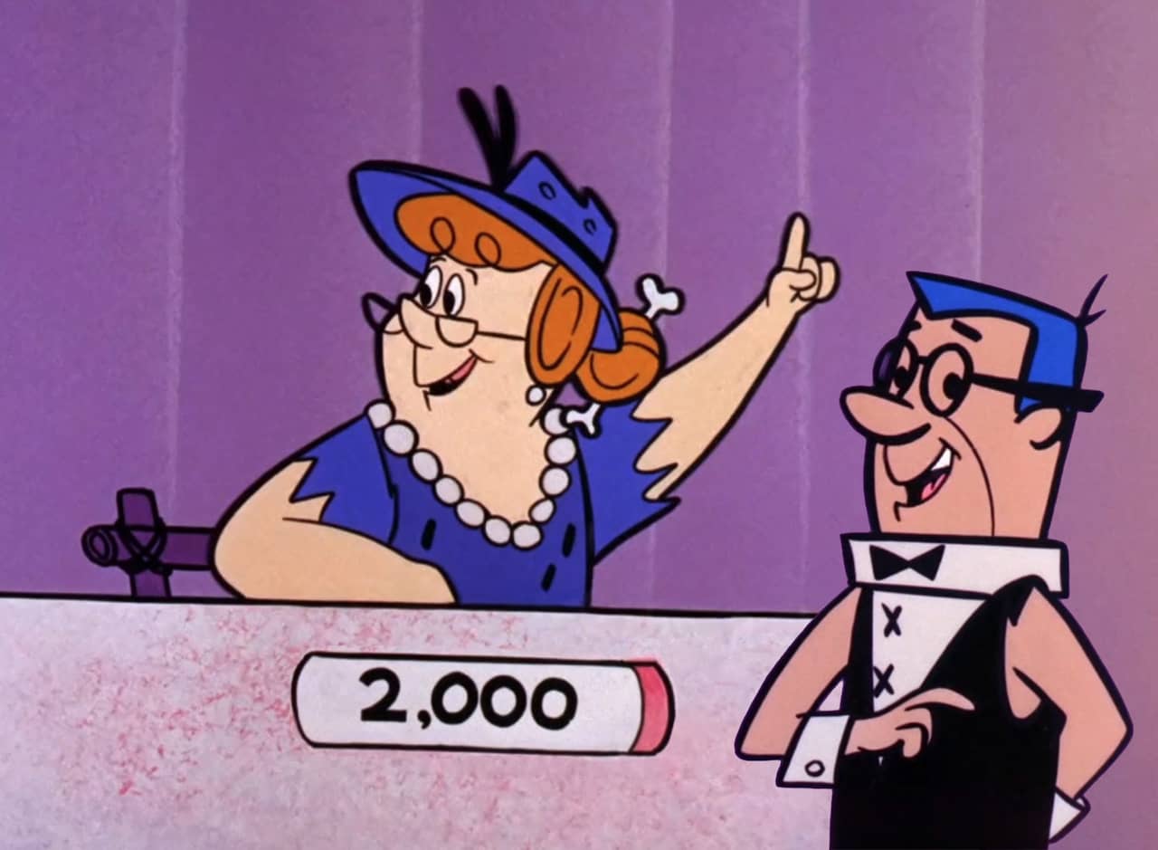 host Will Carson with a woman contestant