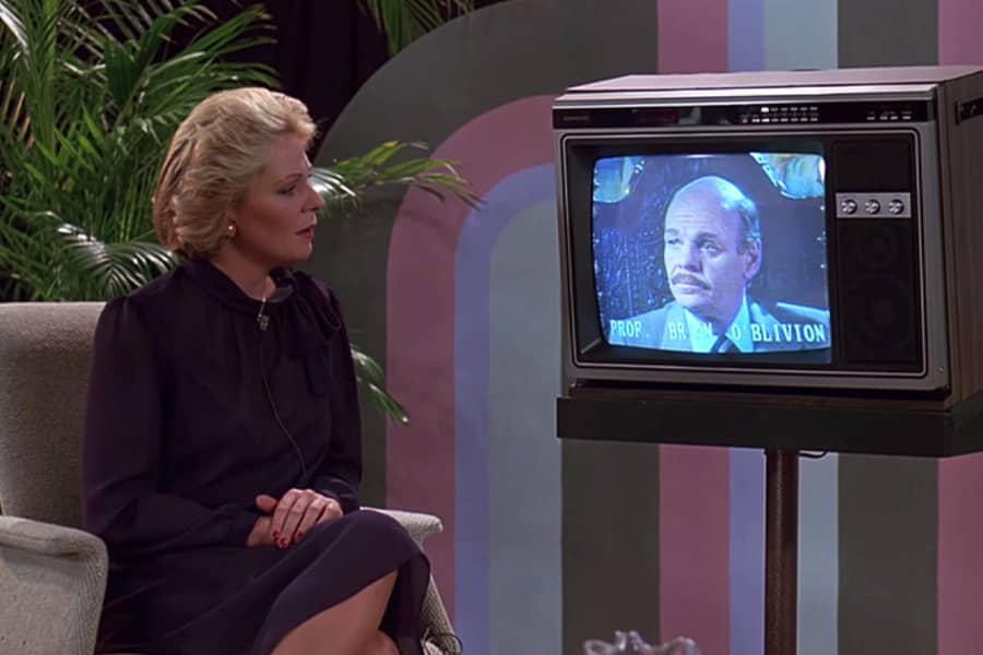 Rena King speaks with Professor Brian O’Blivion who is on a television screen