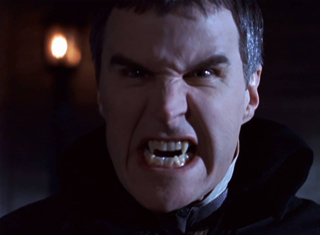 Count Krelski showing his vampire teeth