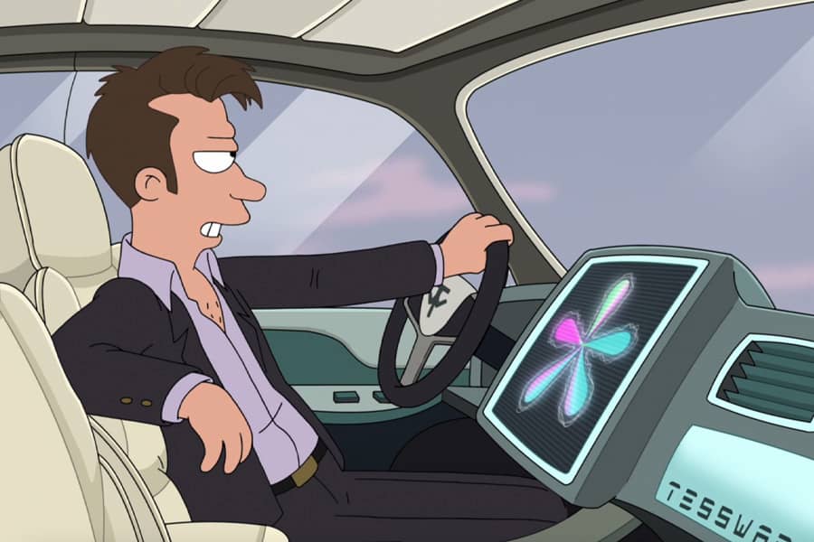 tech guy driving car with AI on a screen