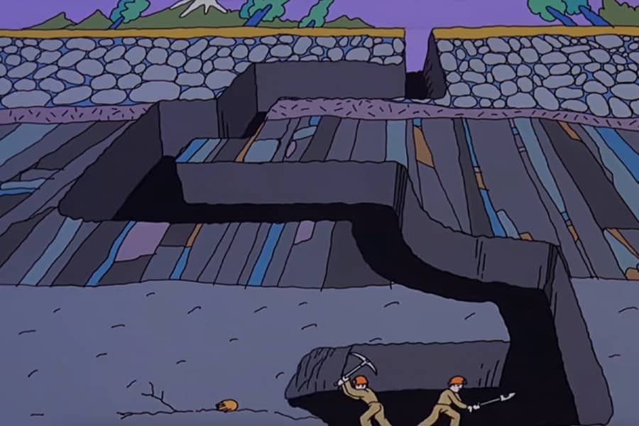 men digging deep into the earth