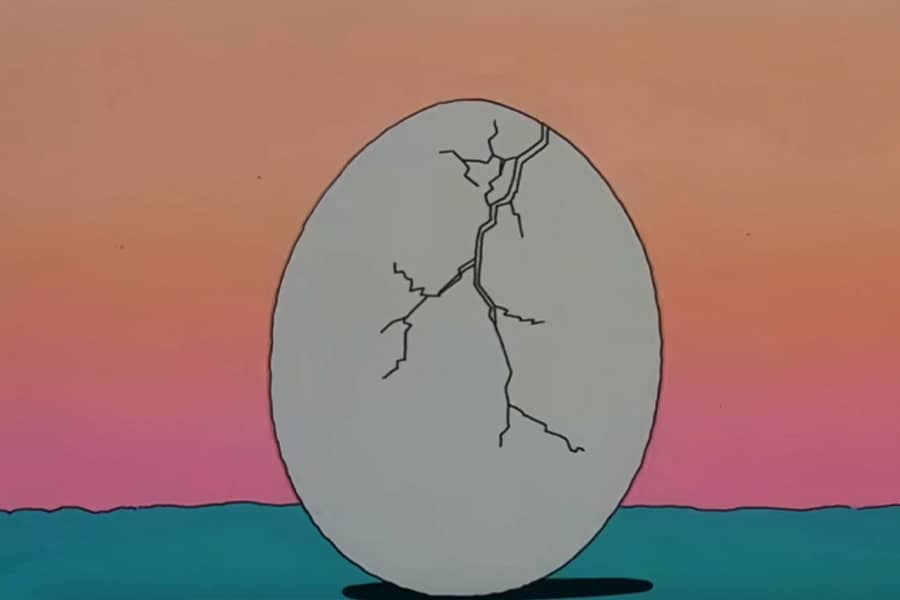 a dinosaur egg cracking open
