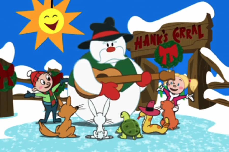 Snowman Hank dancing with the kids and animals on the ranch