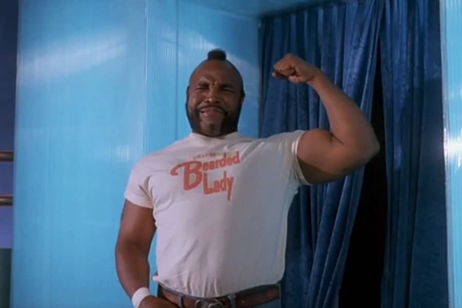 the Bearded Lady, a buff black man with a mohawk