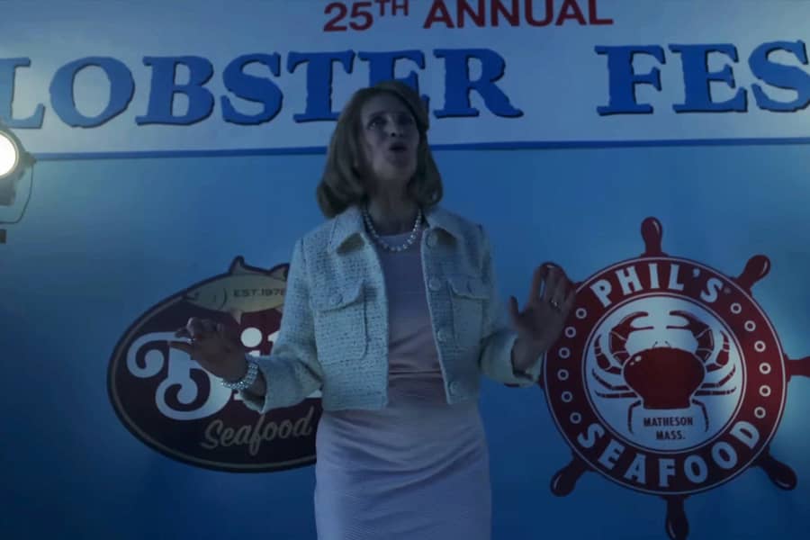a woman politician calming the crowd at the Lobster Fest