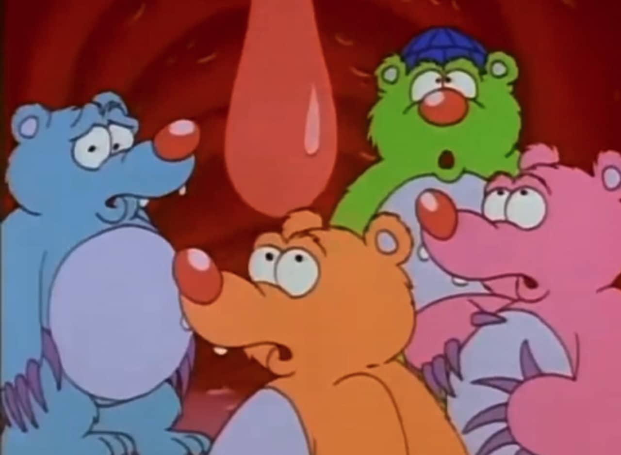 the four Squishy Bearz in a mouth, next to a giant uvula