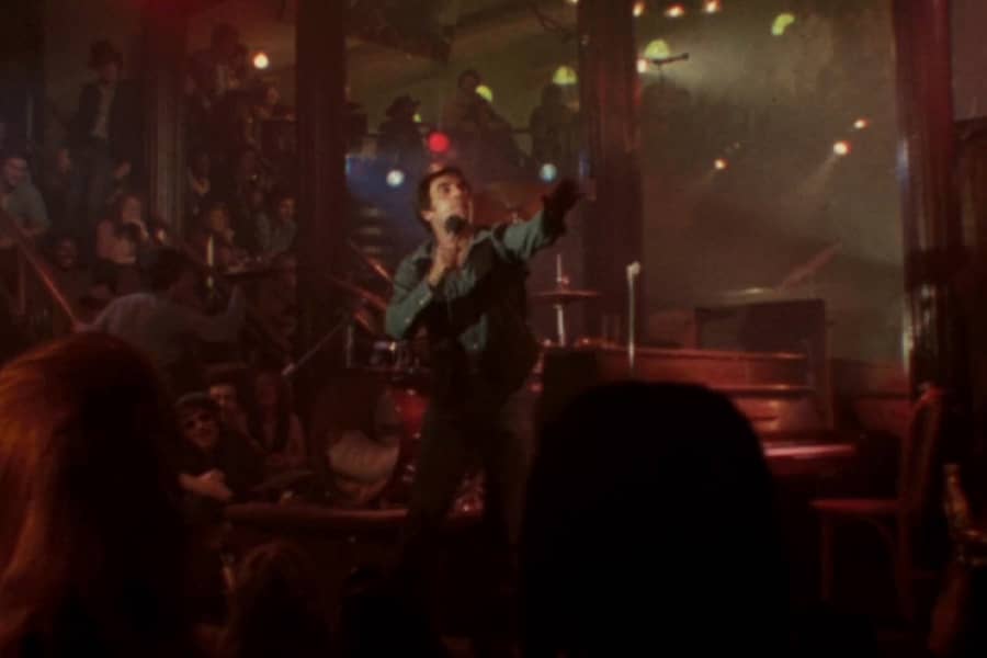 Newman surrounded by audience