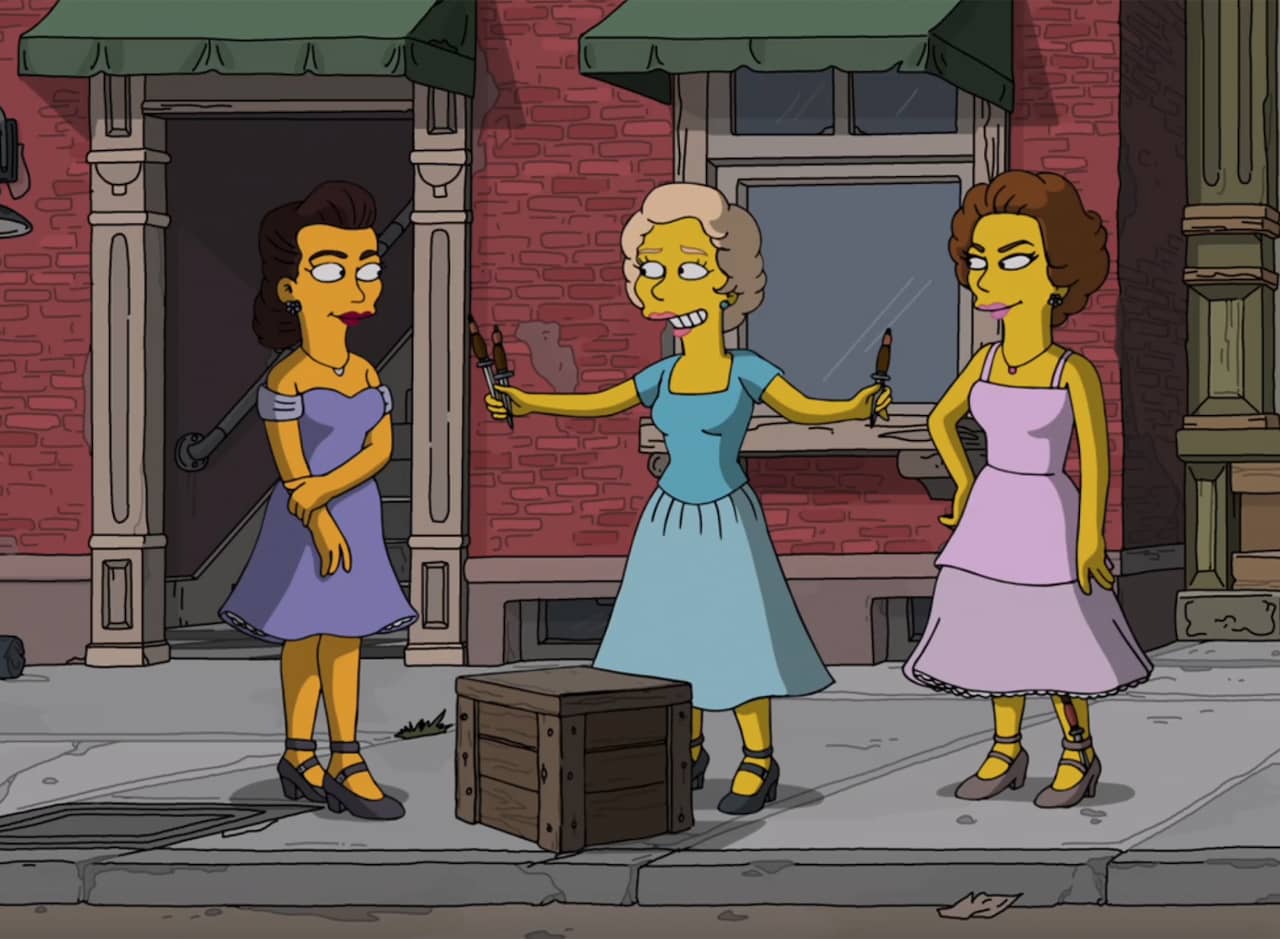 three women on the sidewalk, one of the women is extending knives to the other ones