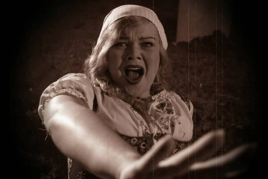 woman screaming with her hand up