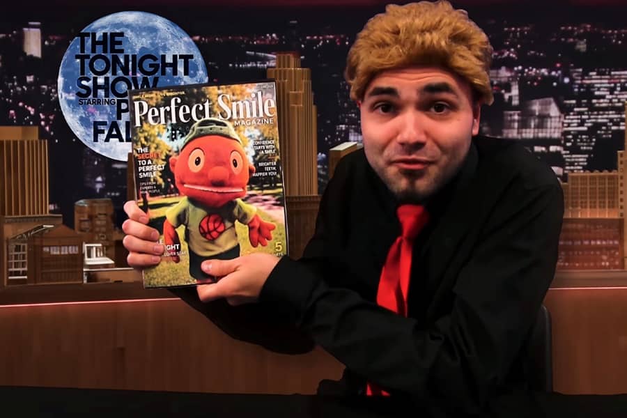 Pooby Fallon holding a Perfect Smile magazine