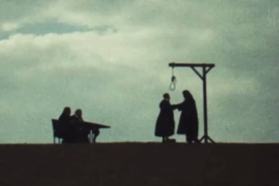 the executioner preparing Master Pfreim under the noose