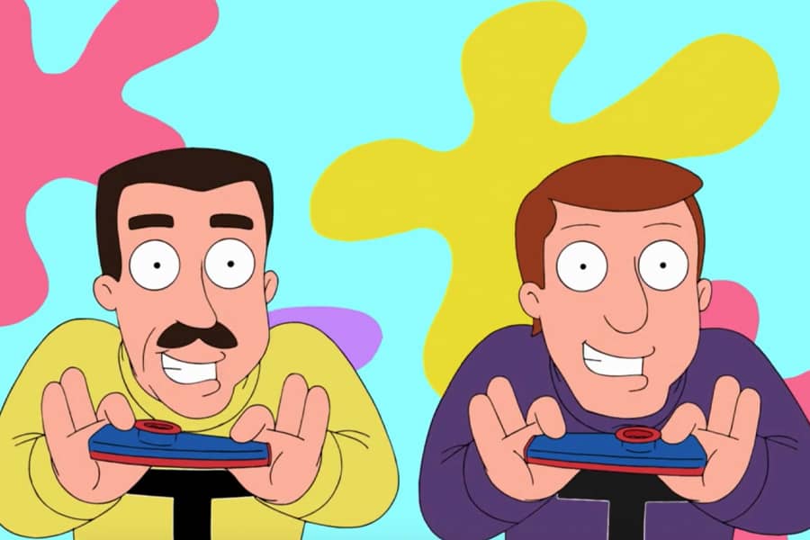 two of the Turtlenecks playing with kazoos