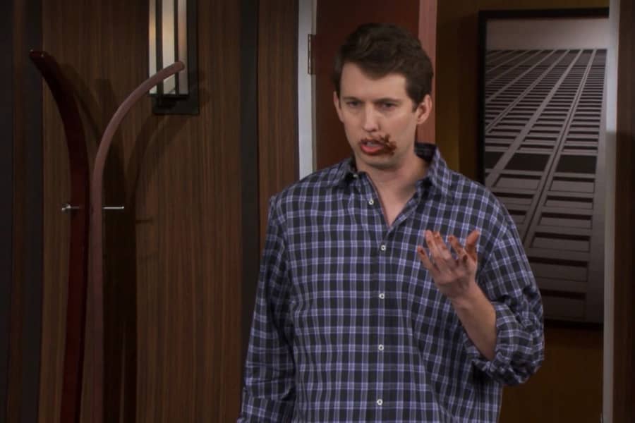 Jon Heder as Narshall who enters the room with chocolate all over his hand and mouth