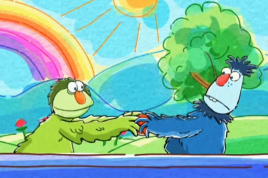 two wuppets fighting over a ball