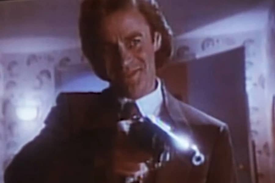 Evian holding a gun