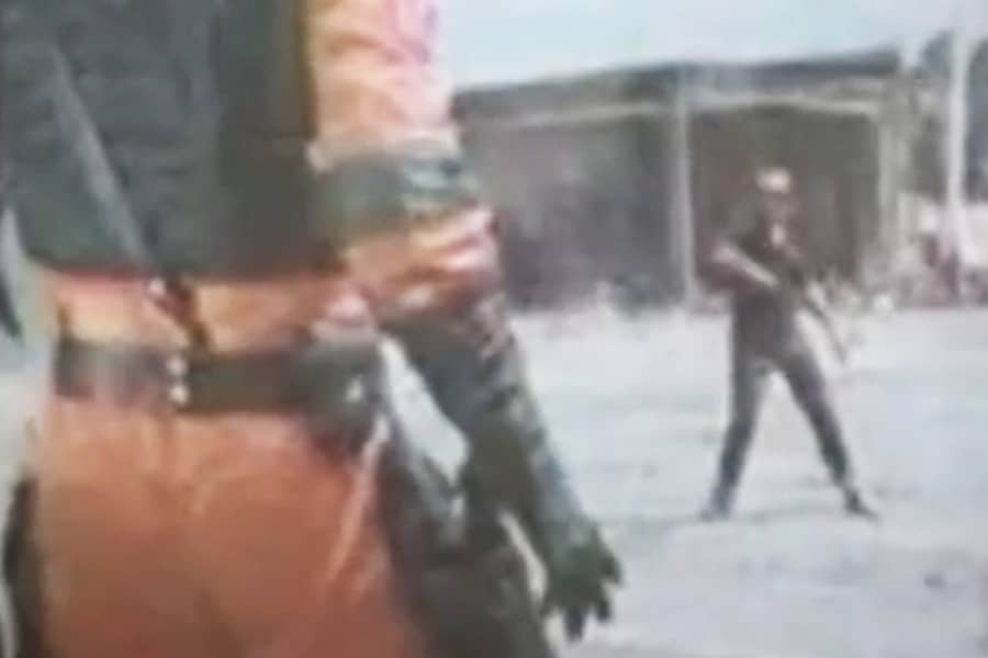Lazer facing down a bad guy