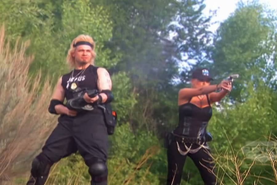 Tommy and Teresa shooting guns