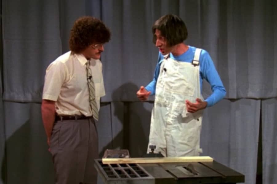 George with a musican in white overalls