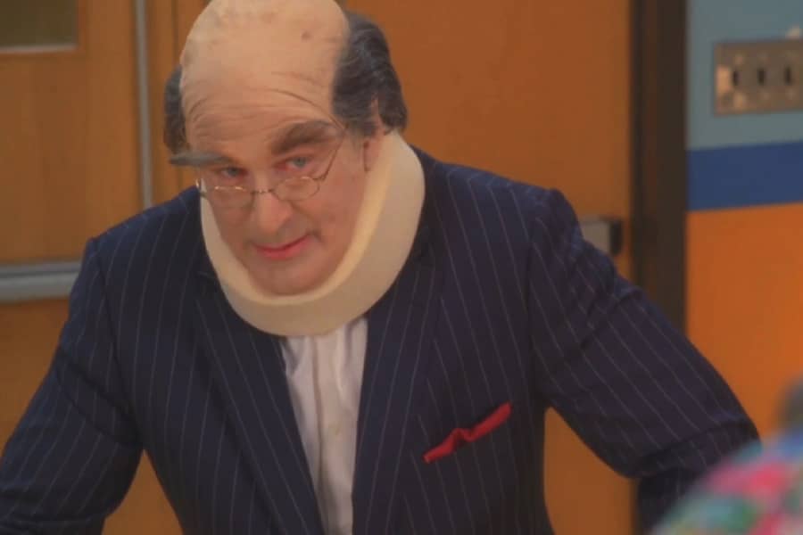 Jack Donaghy in a neck brace