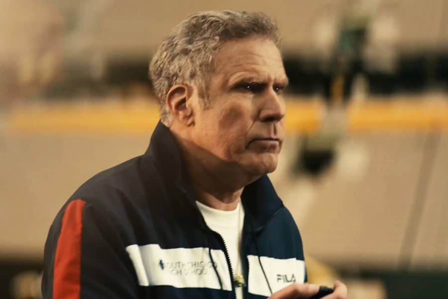 Will Ferrell as Brinkerhoff holding a stop watch