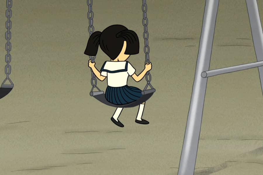 from behind, a little girl in pigtails swinging on a swingset