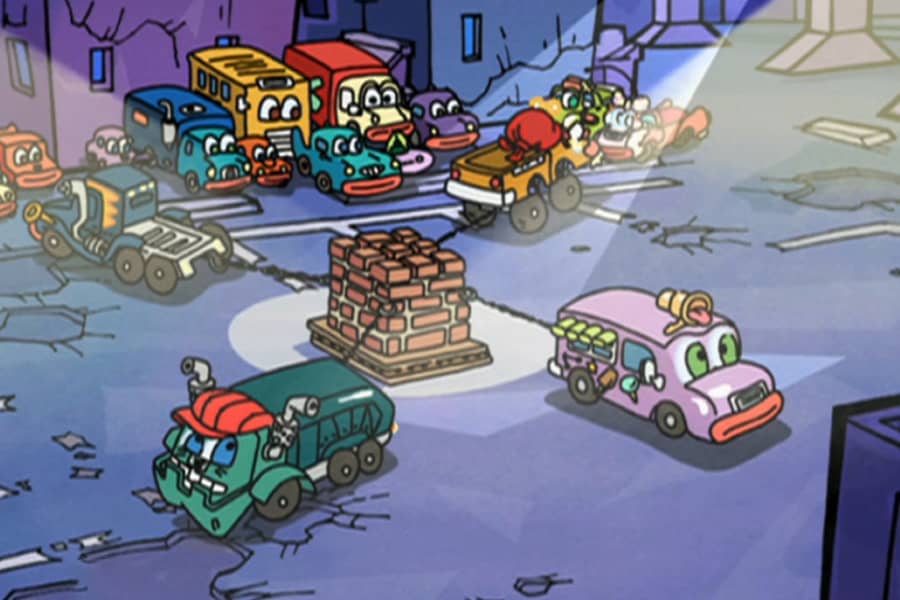 four trucks tethered to a block of bricks