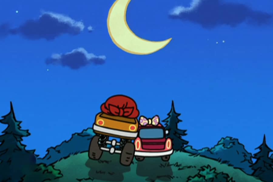 Jonny and Cindy cuddling under the moonlight