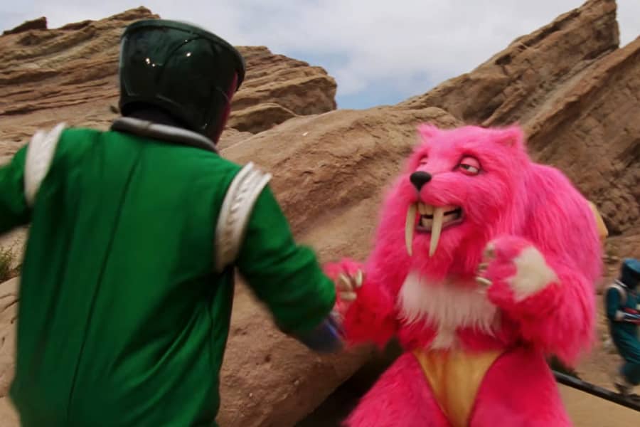 Booster the pink tiger fights a bad guy