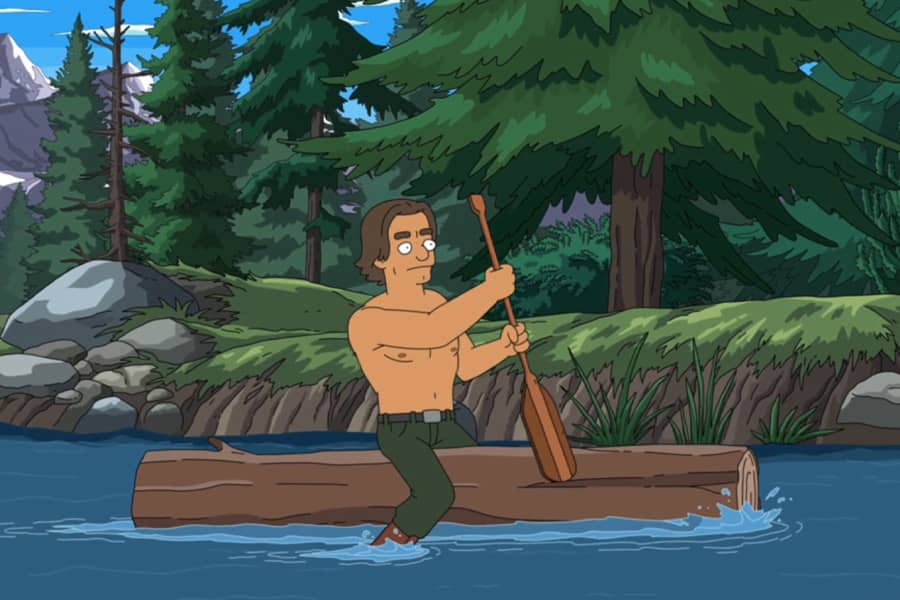 Tusk paddling a log down a river