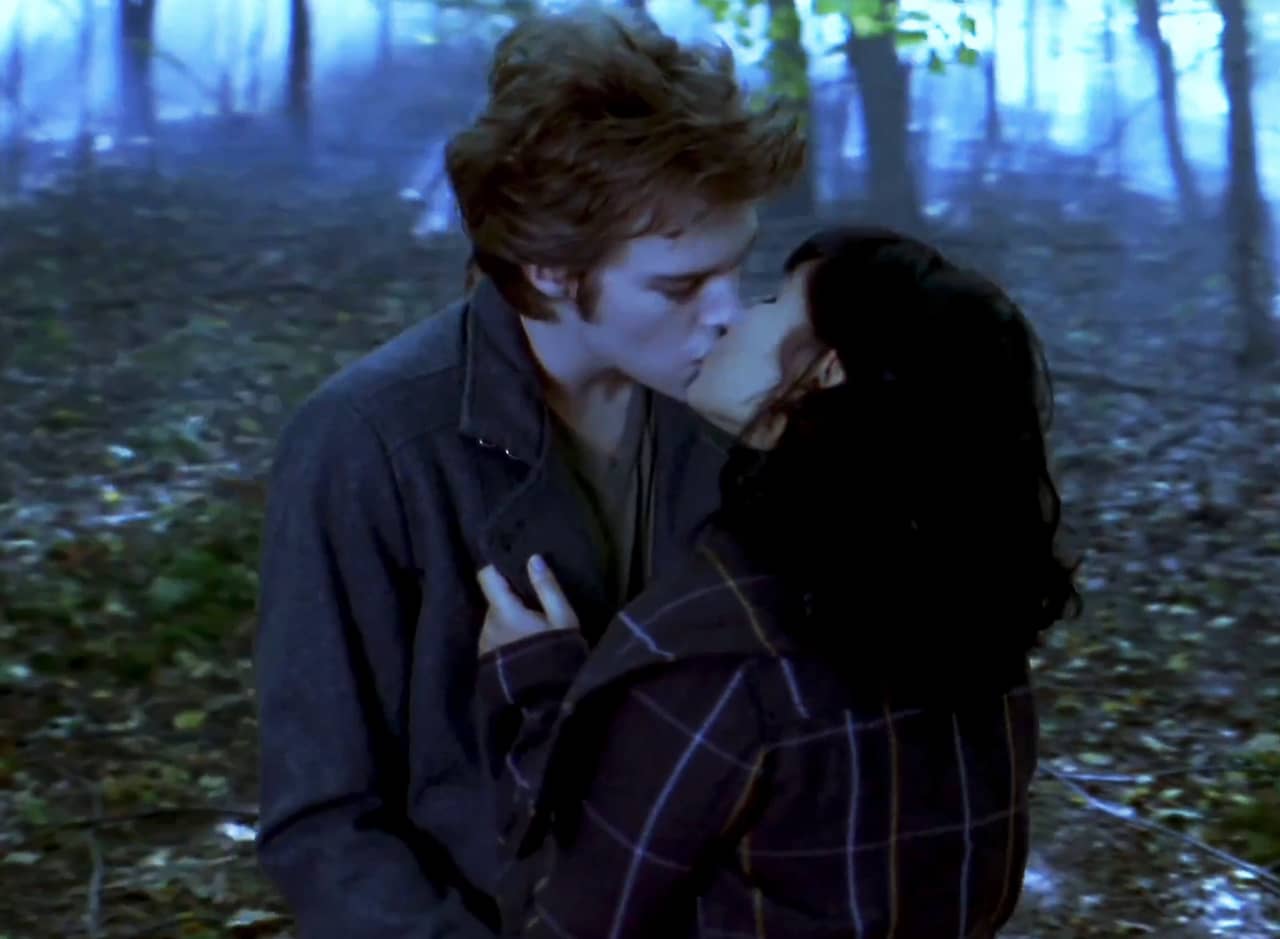 James the vampire and Rochelle the human kissing in the woods
