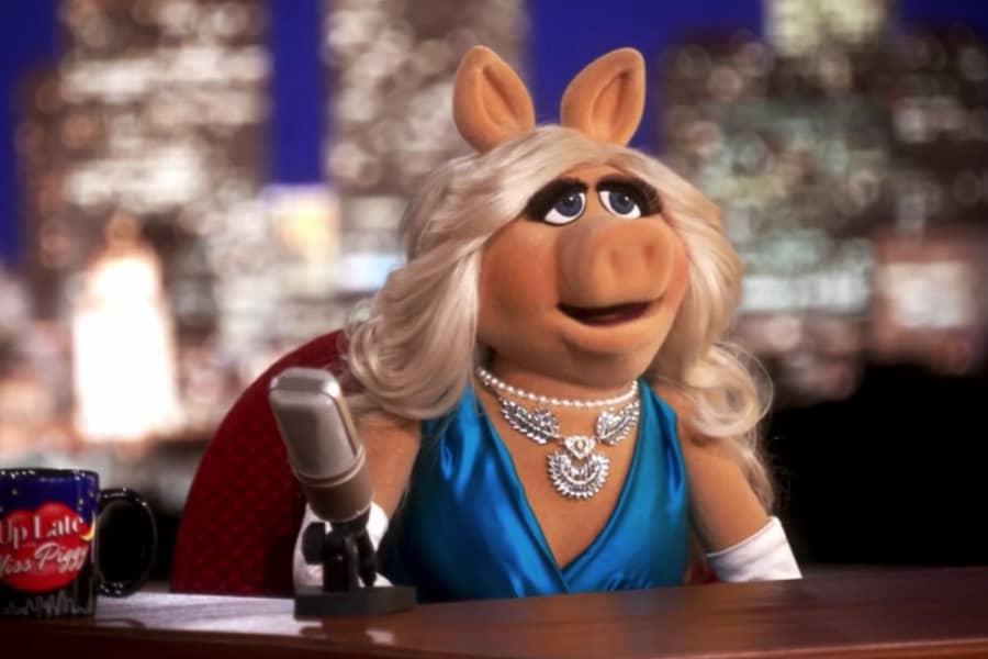 Miss Piggy at her late show desk