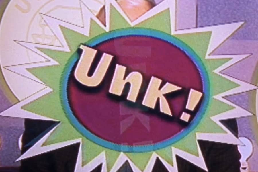 contestant covered by graphic that says “Unk!”