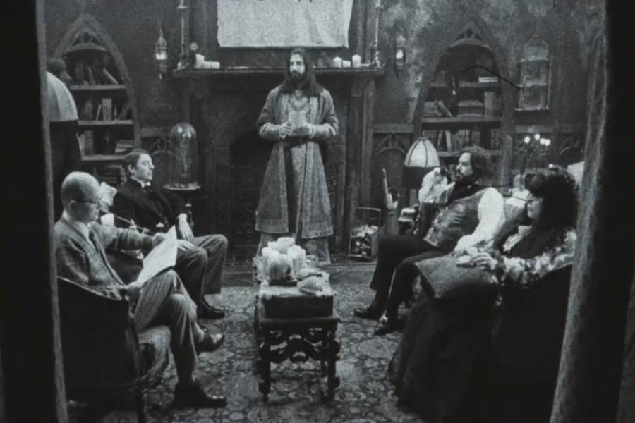 the vampires gather in a sitting room