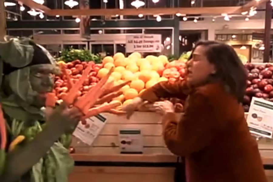 vegetable man chasing the woman through the store