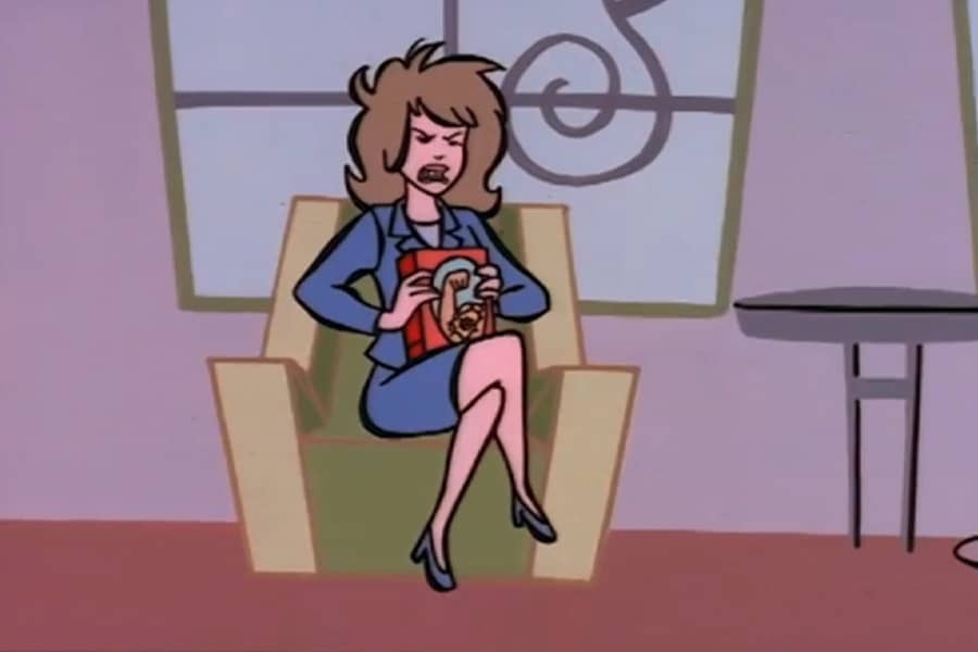 an angry feminist holding a book