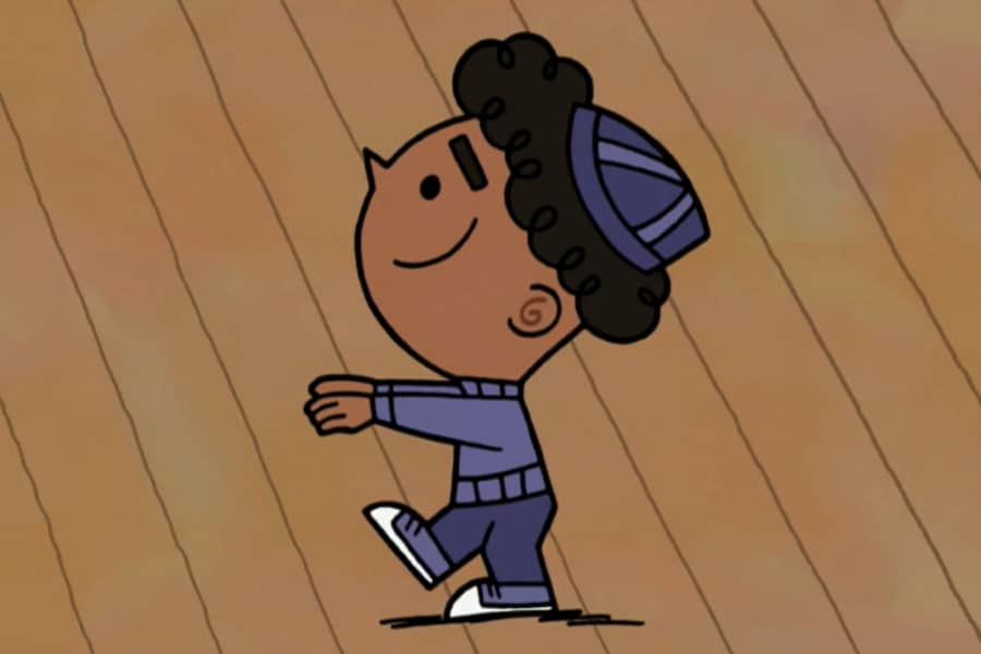 Black kid in yarmulke dancing