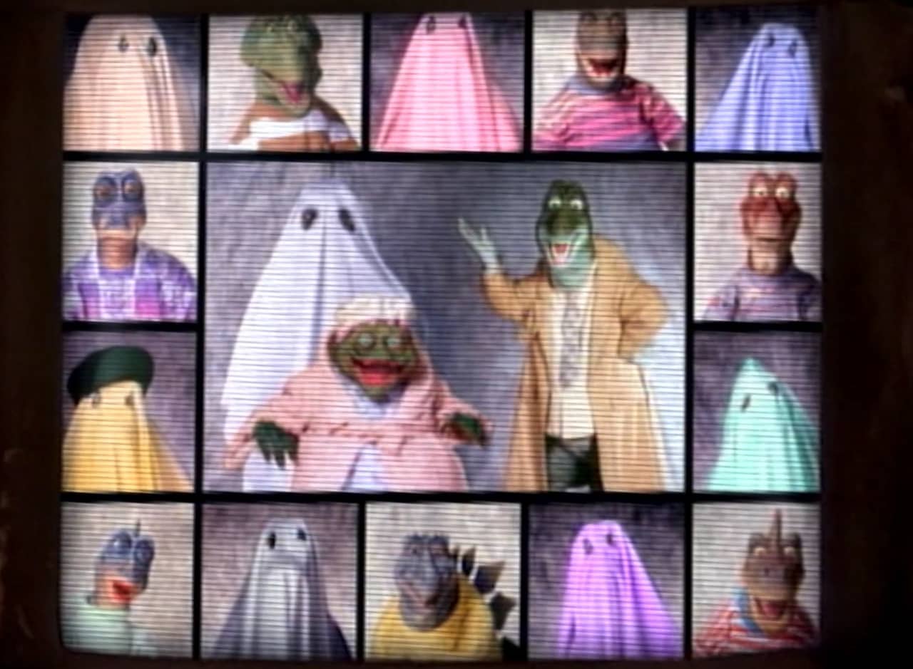 a Brady Bunch like grid of family members made up of various dinosaurs and ghosts