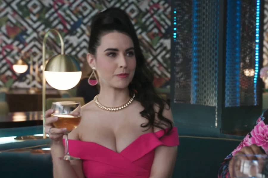 wife #1 is smug with a glass of wine