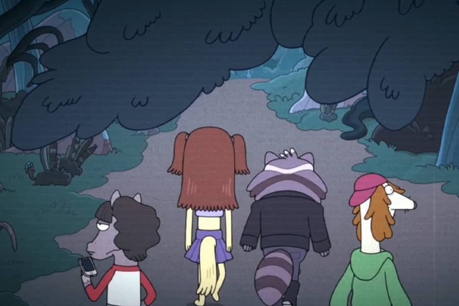 four teens walking through the woods