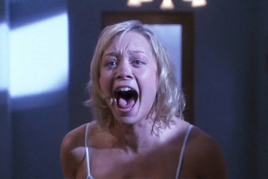young blonde woman screaming