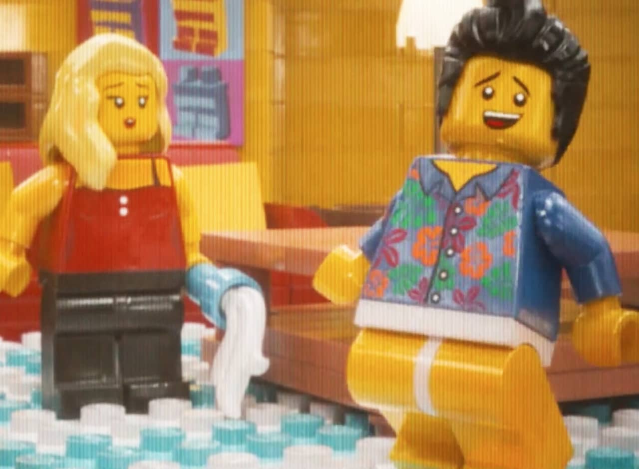 a LEGO minifig laughs as he’s missing his pants