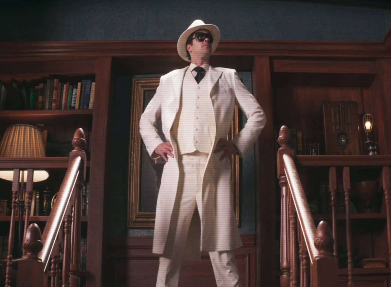 White Hat, a man in an all-white suit and black mask and white hat