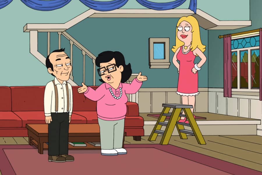 Francine on a step ladder while her Chinese parents speak to her