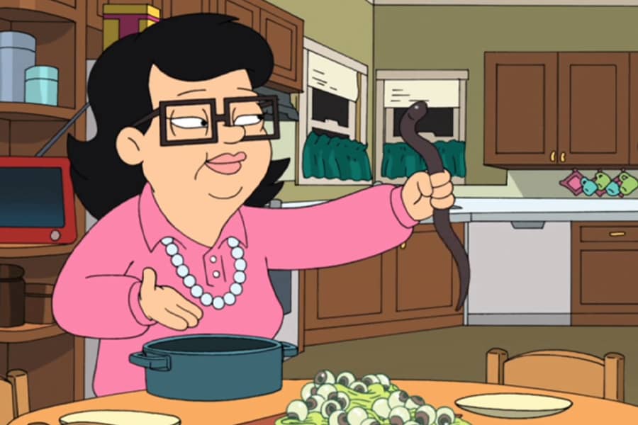Francine’s mother holding an eel in her hand