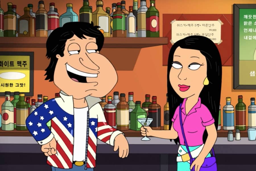 American Johnny chatting with a woman at the bar