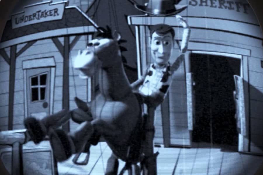 Woody rides Bullseye, both clearly being puppeted with strings