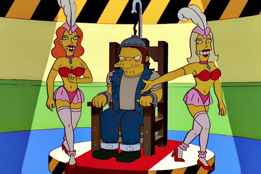 showgirls presenting the prisoner in the chair