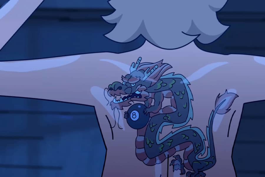 large back tattoo of a dragon holding an 8-ball