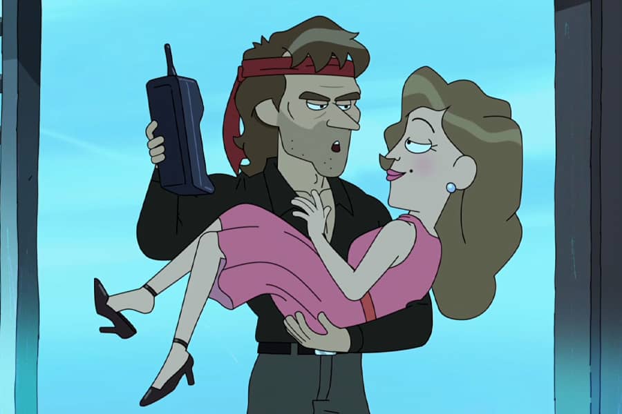 Glenn Dolphman holding a woman and an old school cell phone